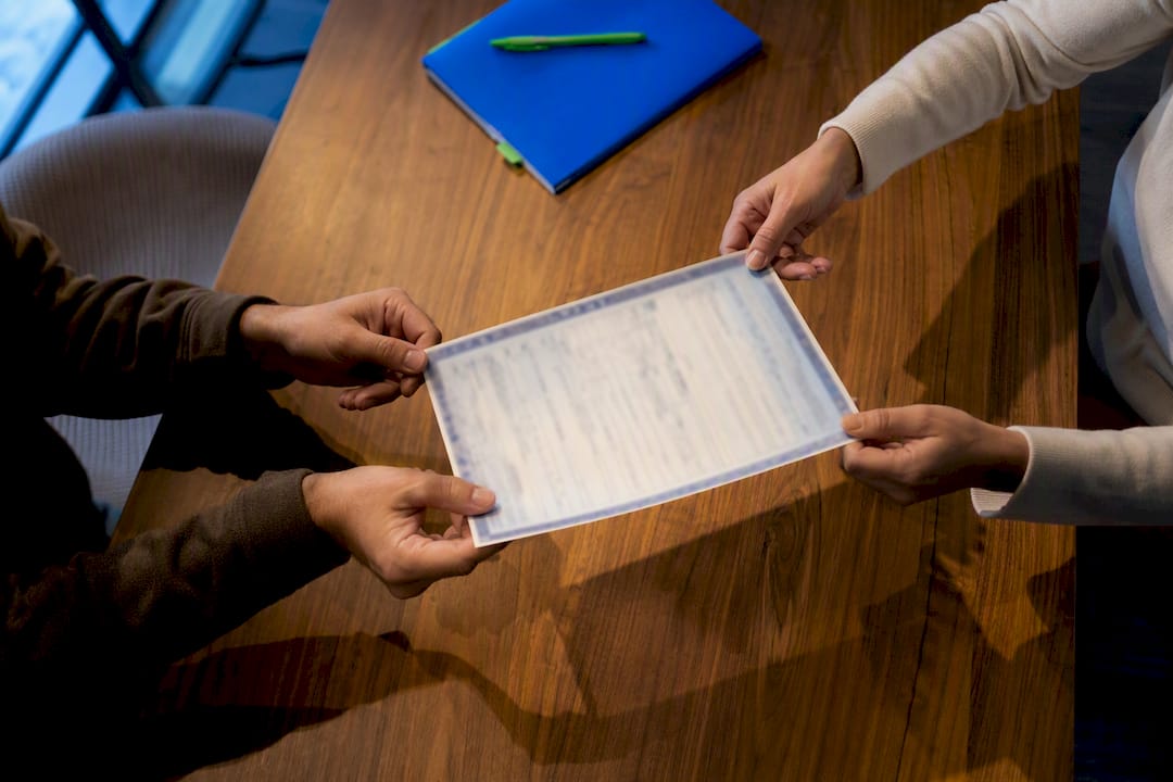 Vehicle title documents during ownership transfer