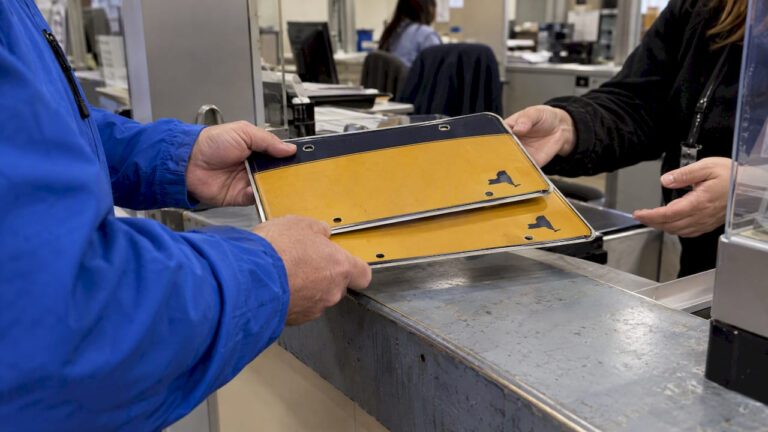 Seller surrendering vehicle plates at DMV